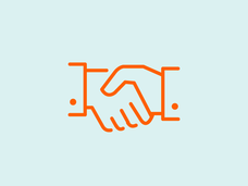 An orange vector design of a handshake.